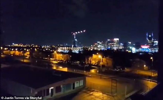 Мъж снима връхлитащо торнадо от върха на 110-метров кран (видео и снимки)
